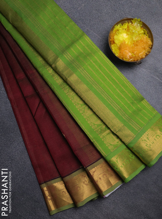 Silk cotton saree maroon and light green with allover vairosi pattern & buttas and elephant zari woven border