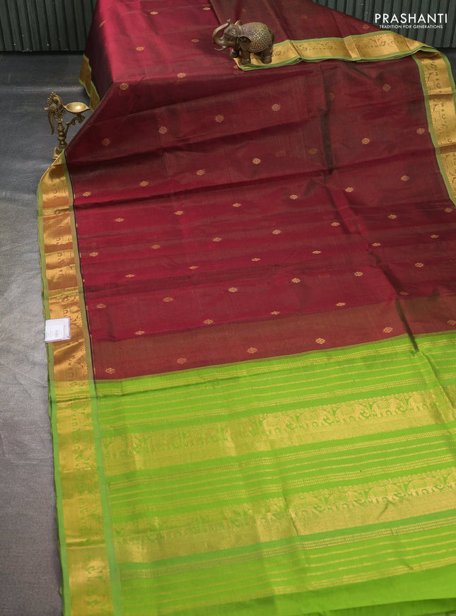 Silk cotton saree maroon and light green with allover vairosi pattern & buttas and elephant zari woven border