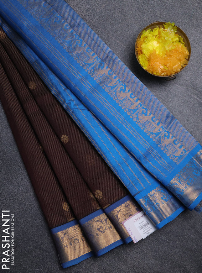 Silk cotton saree coffee brown and cs blue with allover vairosi pattern & buttas and elephant zari woven border