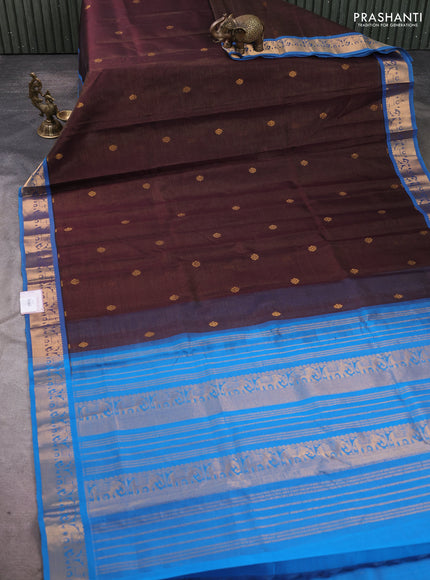 Silk cotton saree coffee brown and cs blue with allover vairosi pattern & buttas and elephant zari woven border