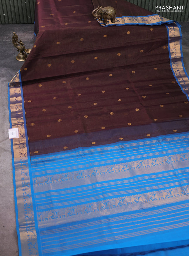Silk cotton saree coffee brown and cs blue with allover vairosi pattern & buttas and elephant zari woven border