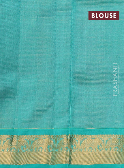 Silk cotton saree purple and teal green with allover vairosi pattern & buttas and elephant zari woven border