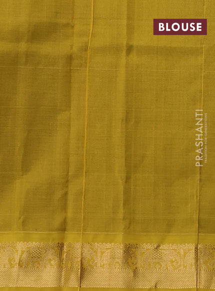 Silk cotton saree coffee brown and mustard yellow with allover vairosi pattern & buttas and elephant zari woven border