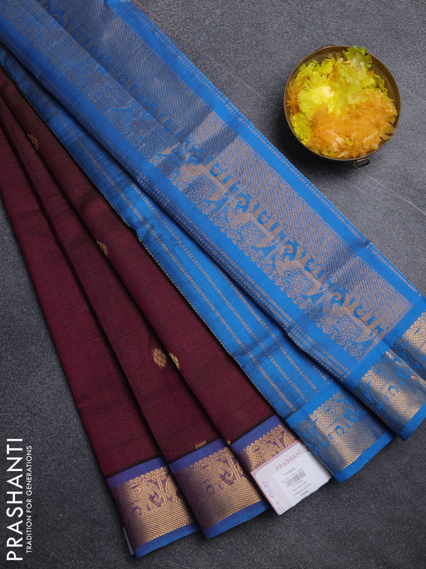 Silk cotton saree deep purple and cs blue with allover vairosi pattern & buttas and elephant zari woven border
