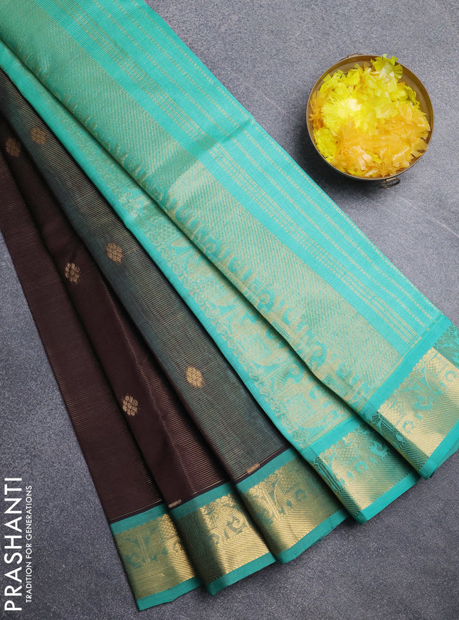 Silk cotton saree coffee brown and teal green with allover vairosi pattern & buttas and elephant zari woven border
