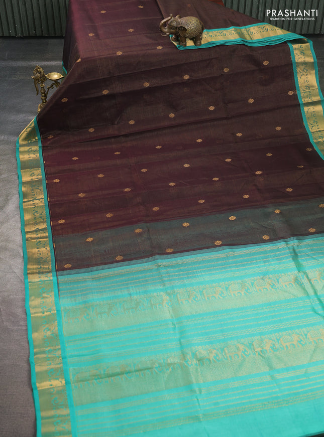 Silk cotton saree coffee brown and teal green with allover vairosi pattern & buttas and elephant zari woven border