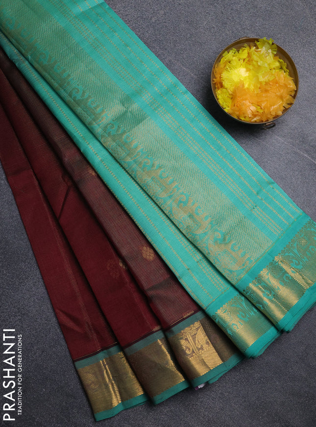 Silk cotton saree wine shade and teal green with allover vairosi pattern & buttas and elephant zari woven border