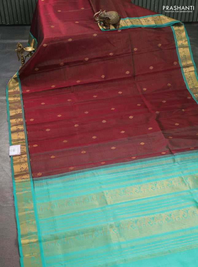 Silk cotton saree wine shade and teal green with allover vairosi pattern & buttas and elephant zari woven border