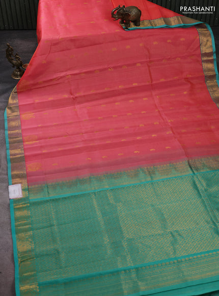 Silk cotton saree peach shade and teal green with allover vairosi pattern & buttas and annam zari woven border