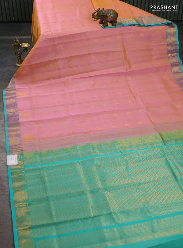 Silk cotton saree dual shaade of pinkish yellow and teal green with allover vairosi pattern & buttas and annam zari woven border