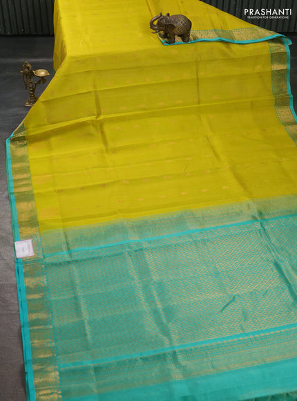 Silk cotton saree lime green and teal green with allover vairosi pattern & buttas and annam zari woven border