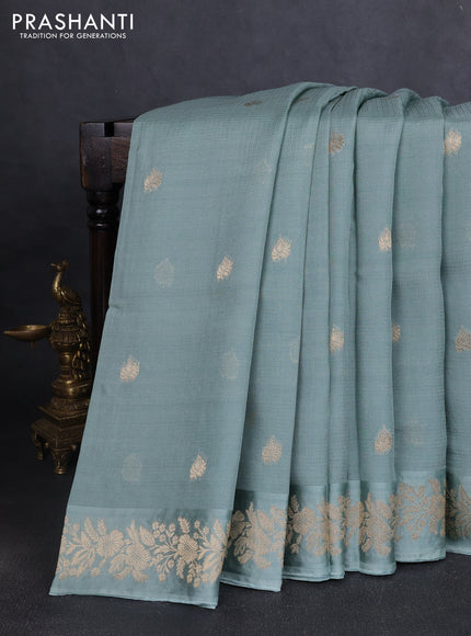 Silk kota saree pastel green shade with zari woven buttas and floral zari woven border