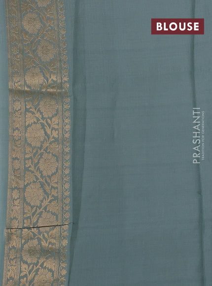 Silk kota saree pastel green shade with zari woven buttas and floral zari woven border