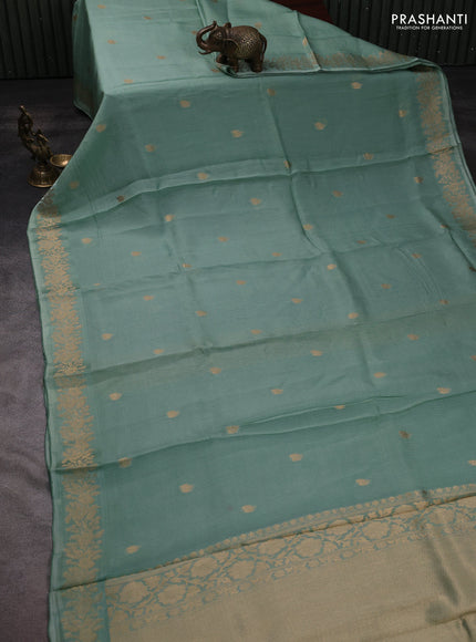 Silk kota saree teal green with zari woven buttas and floral zari woven border