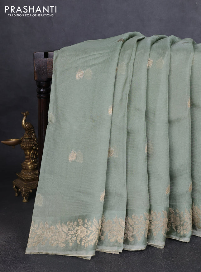 Silk kota saree pastel green with zari woven buttas and floral zari woven border