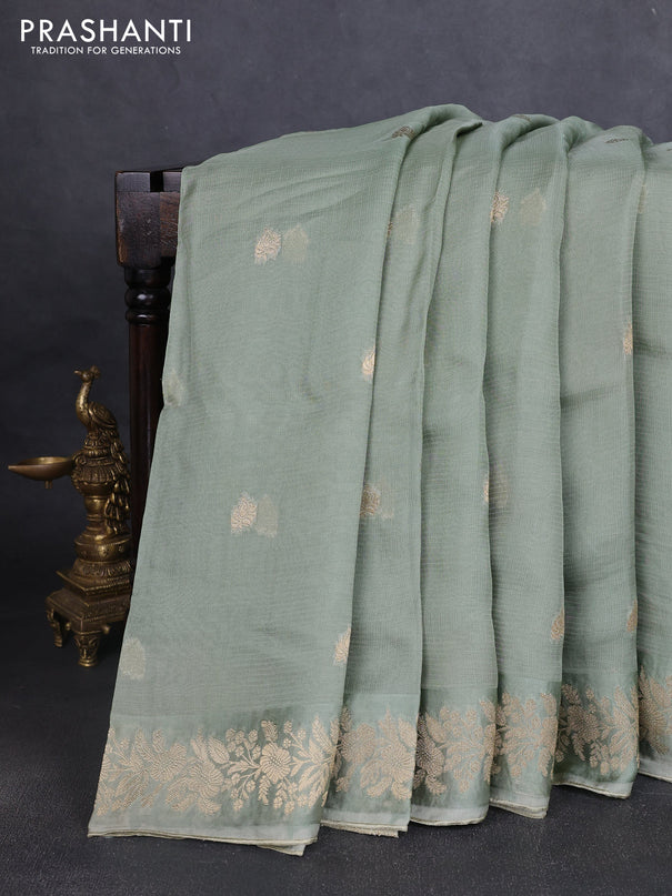 Silk kota saree pastel green with zari woven buttas and floral zari woven border