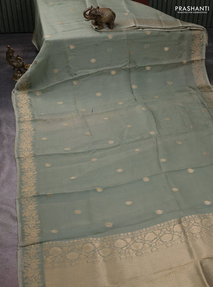 Silk kota saree pastel green with zari woven buttas and floral zari woven border