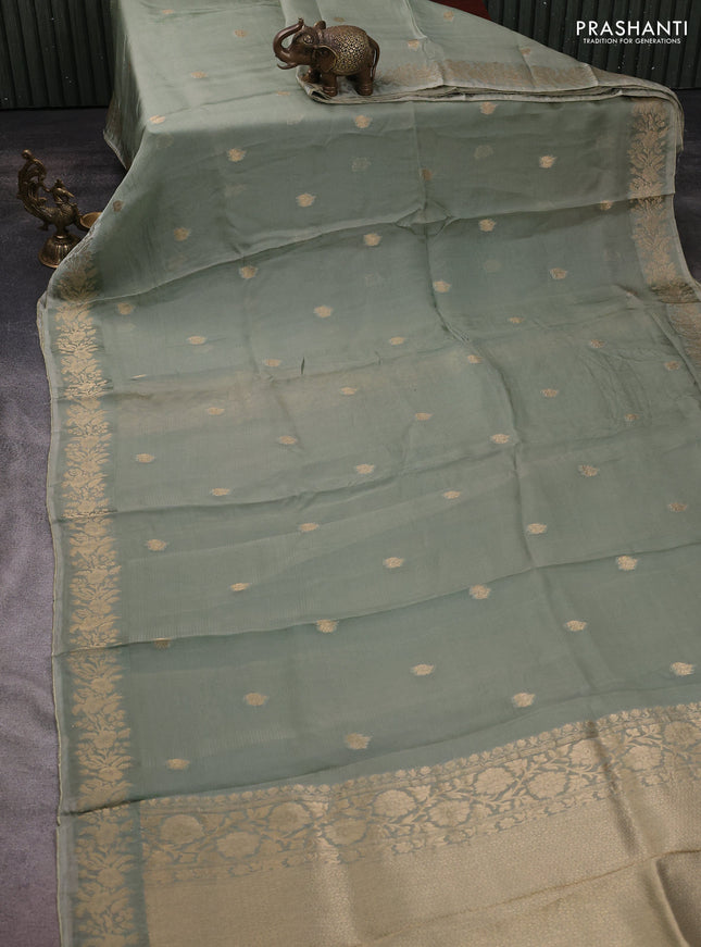 Silk kota saree pastel green with zari woven buttas and floral zari woven border