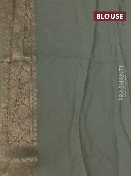 Silk kota saree pastel green with zari woven buttas and floral zari woven border