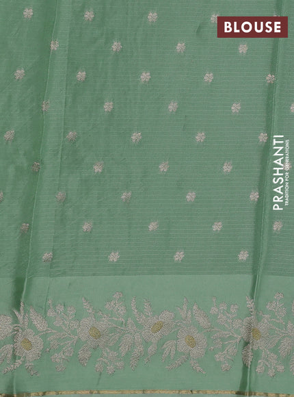 Silk kota saree pista green with zari woven buttas and zari woven border