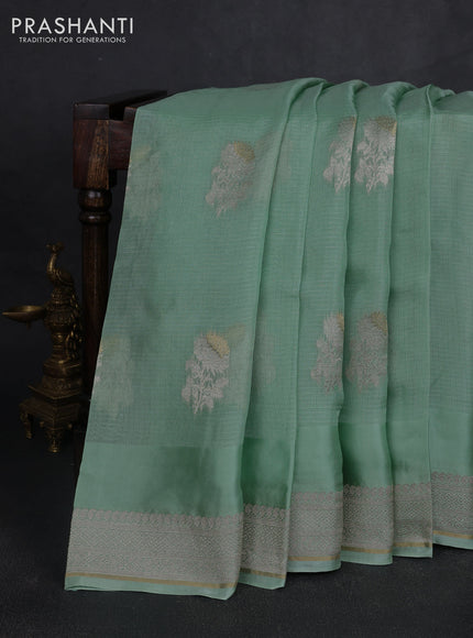 Silk kota saree teal green with floral zari woven buttas and zari woven border