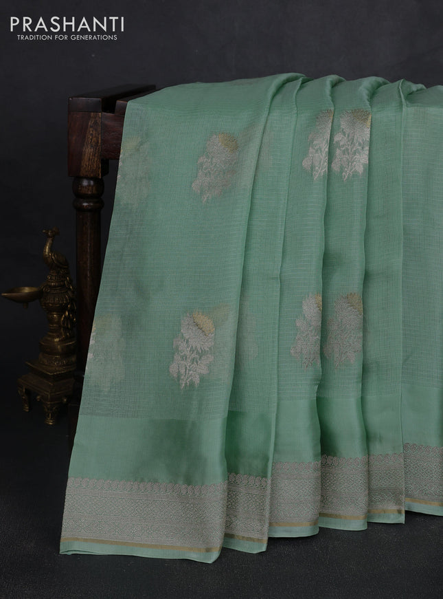Silk kota saree teal green with floral zari woven buttas and zari woven border