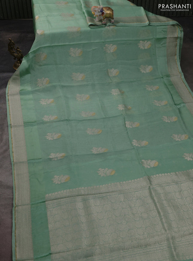 Silk kota saree teal green with floral zari woven buttas and zari woven border