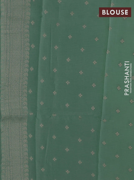 Silk kota saree teal green with floral zari woven buttas and zari woven border