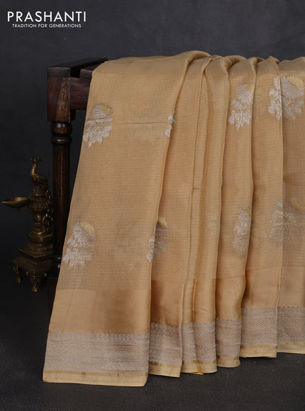 Silk kota saree sandal with floral zari woven buttas and zari woven border
