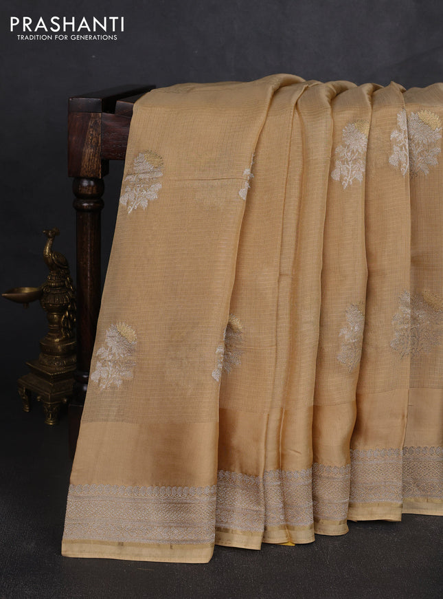 Silk kota saree sandal with floral zari woven buttas and zari woven border