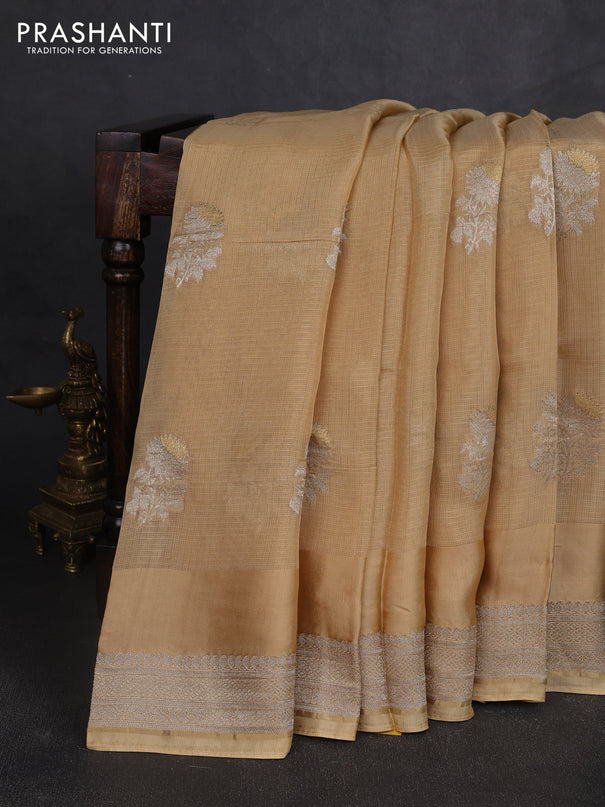 Silk kota saree sandal with floral zari woven buttas and zari woven border