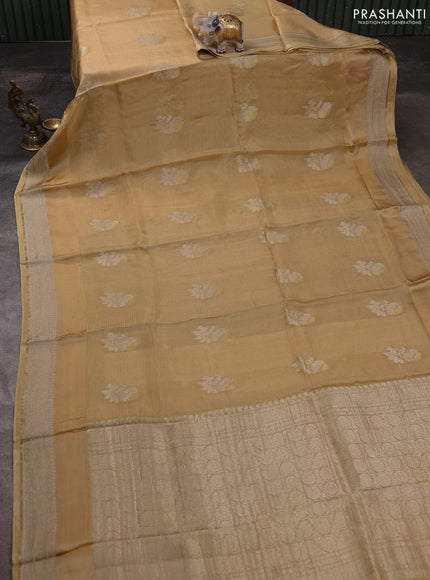 Silk kota saree sandal with floral zari woven buttas and zari woven border