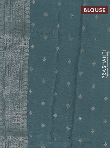 Silk kota saree pastel blue shade with floral zari woven buttas and zari woven border