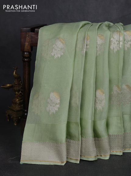 Silk kota saree pista green with floral zari woven buttas and zari woven border