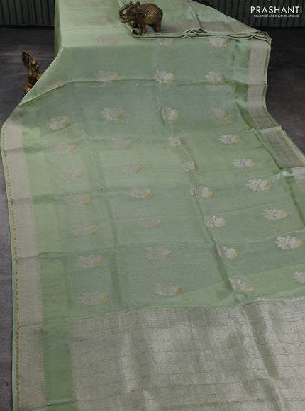 Silk kota saree pista green with floral zari woven buttas and zari woven border
