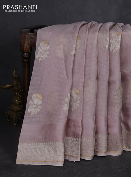 Silk kota saree pastel pink shade with floral zari woven buttas and zari woven border