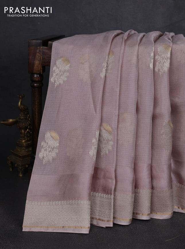 Silk kota saree pastel pink shade with floral zari woven buttas and zari woven border