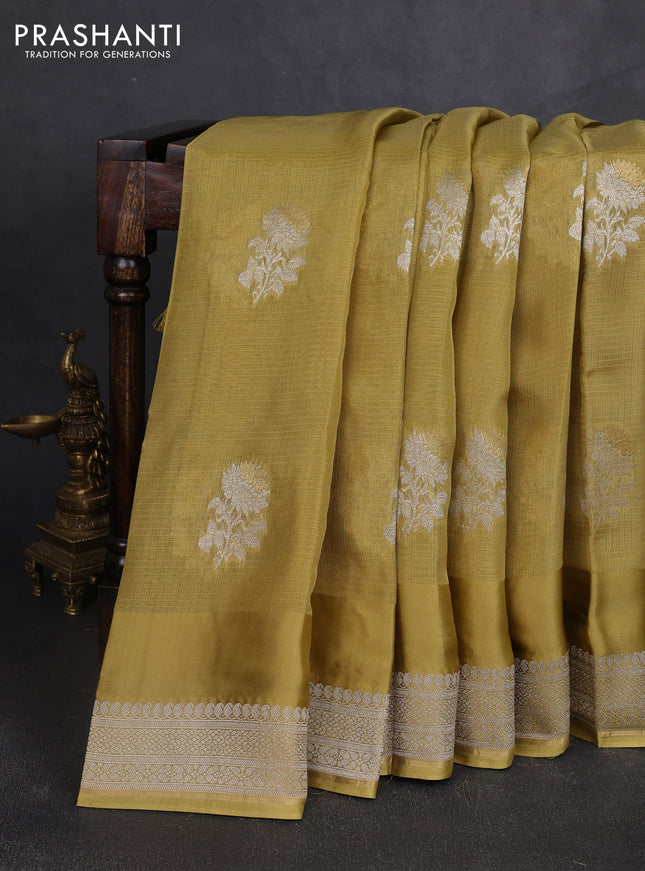 Silk kota saree mustard green with floral zari woven buttas and zari woven border