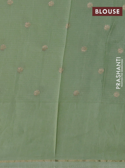 Silk kota saree pista green with allover zari woven buttas and floral design paithani style border