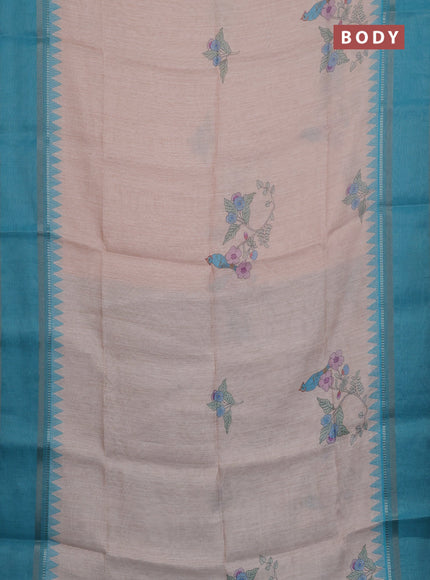 Art Linen saree teal blue with allover floal prints and temple design rettapet zari woven border
