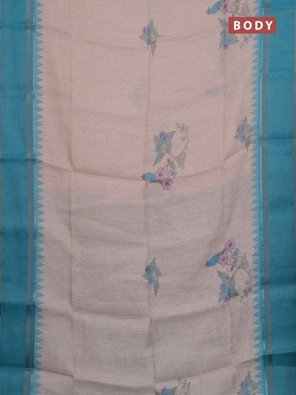 Art Linen saree teal blue with allover floal prints and temple design rettapet zari woven border
