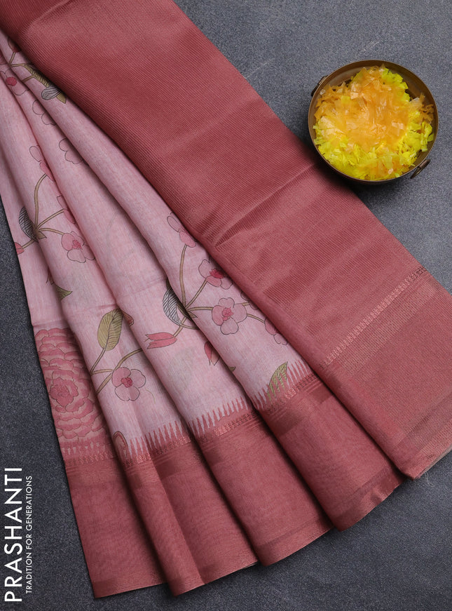 Art Linen saree peach shade with allover floal prints and temple design rettapet zari woven border