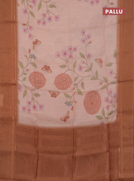 Art Linen saree pale orange and rust shade with allover floal prints and temple design rettapet zari woven border