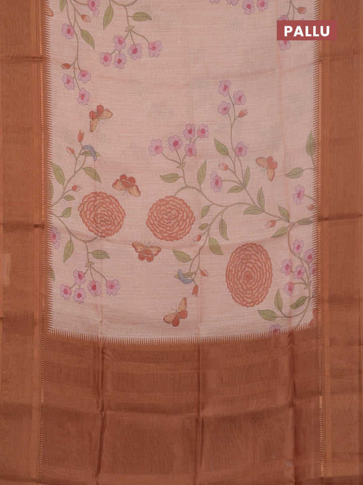 Art Linen saree pale orange and rust shade with allover floal prints and temple design rettapet zari woven border