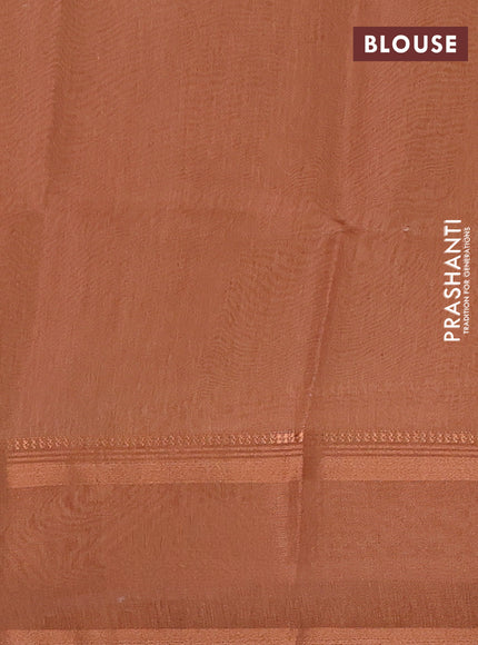 Art Linen saree pale orange and rust shade with allover floal prints and temple design rettapet zari woven border