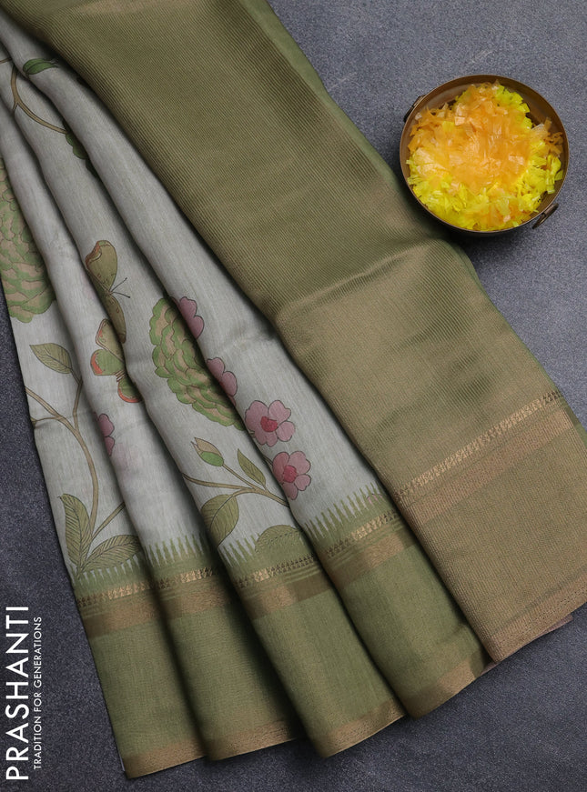 Art Linen saree pastel green and mehendi green with allover floal prints and temple design rettapet zari woven border