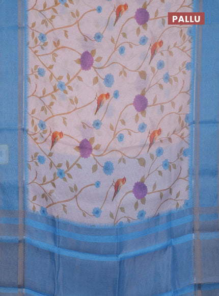 Art Linen saree pastel blue and blue shade with allover floral prints and temple design rettapet zari woven border