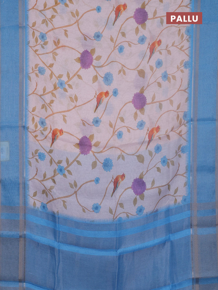 Art Linen saree pastel blue and blue shade with allover floral prints and temple design rettapet zari woven border