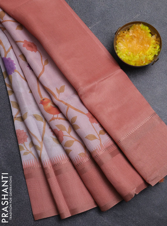 Art Linen saree peach shade with allover floral prints and temple design rettapet zari woven border
