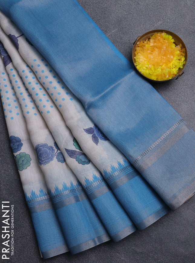 Art Linen saree pastel blue and blue with allover floral prints and temple design rettapet zari woven border